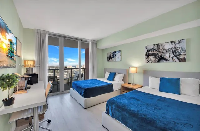 a view of a city with tall buildings