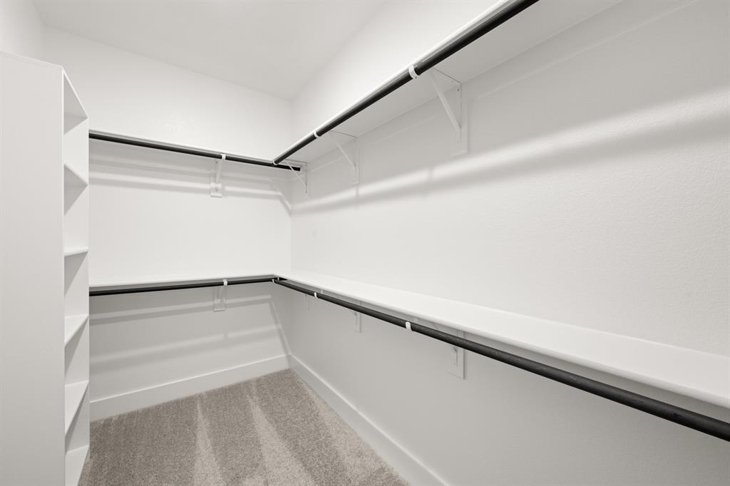 620 Red Maple Road Waxahachie, TX 75165 - Photo 32 of 40 a view of an empty walk in closet