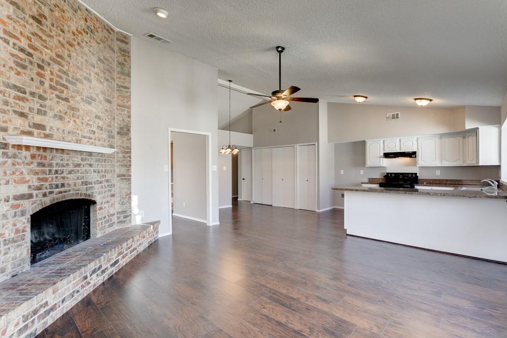 9421 Shipman Street Rowlett, TX 75088 - Photo 11 of 29 a view of an empty room and kitchen view