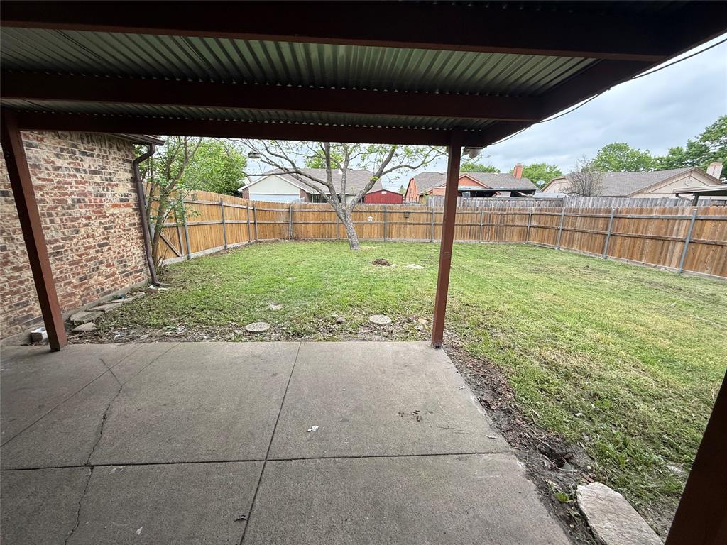 9421 Shipman Street Rowlett, TX 75088 - Photo 26 of 29 a view of a backyard with plants