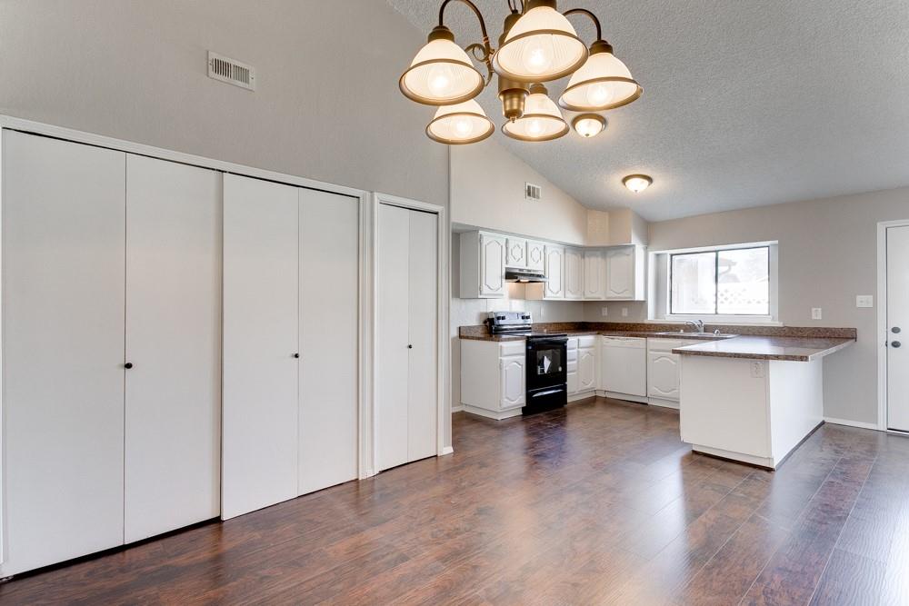 9421 Shipman Street Rowlett, TX 75088 - Photo 7 of 29 a kitchen with a counter space cabinets and appliances