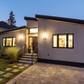 a house view with a backyard