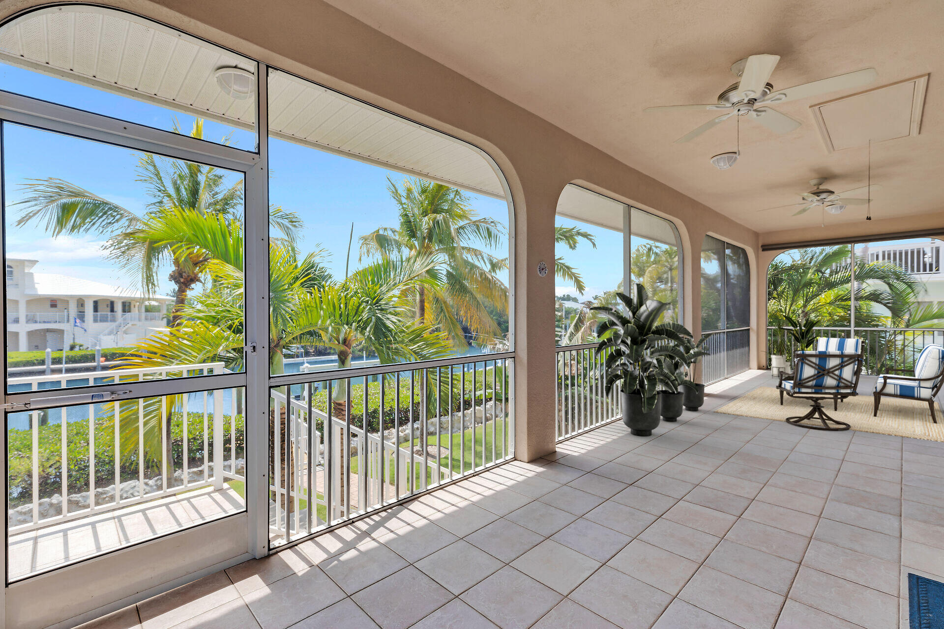 845 Copa D Oro Marathon, FL 33050 - Photo 15 of 41 a view of a porch with chairs and tables