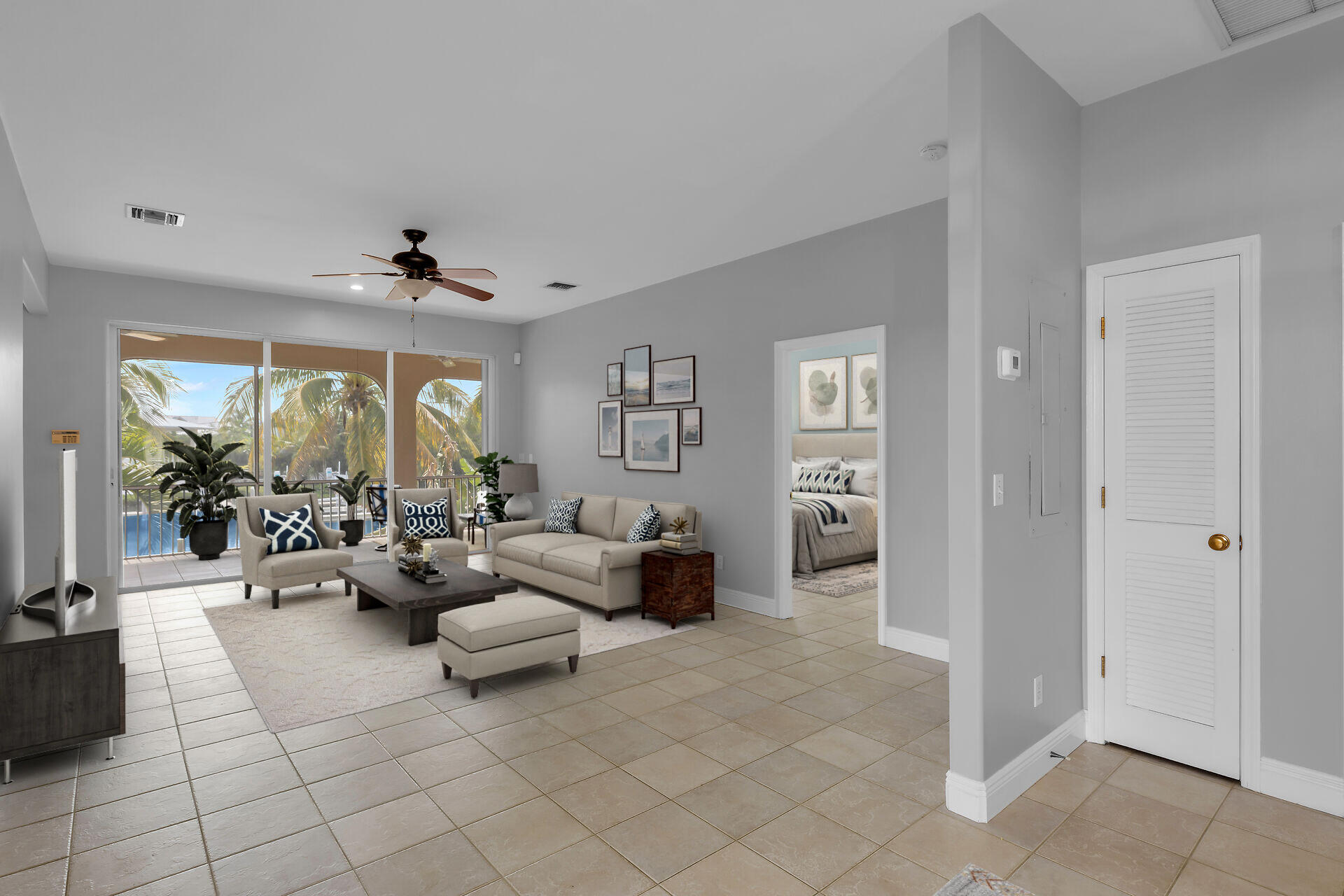845 Copa D Oro Marathon, FL 33050 - Photo 18 of 41 a living room with furniture and a large window