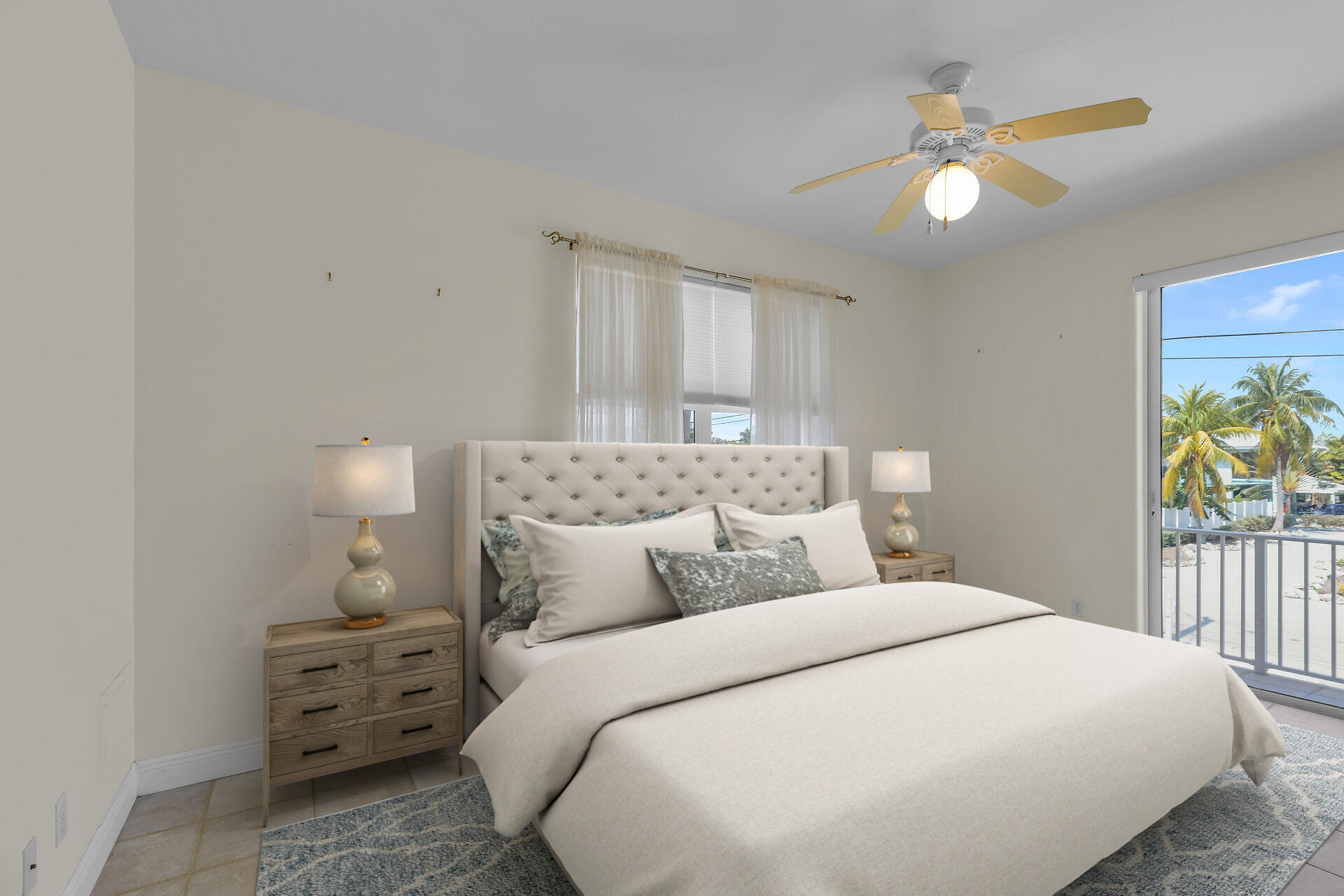 845 Copa D Oro Marathon, FL 33050 - Photo 28 of 41 a bedroom with a bed and a chandelier