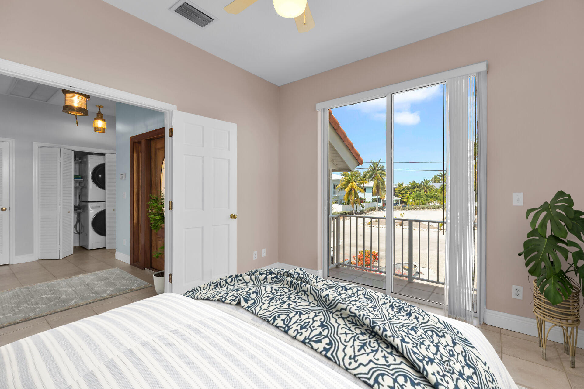 845 Copa D Oro Marathon, FL 33050 - Photo 35 of 41 a bedroom with a bed and a window