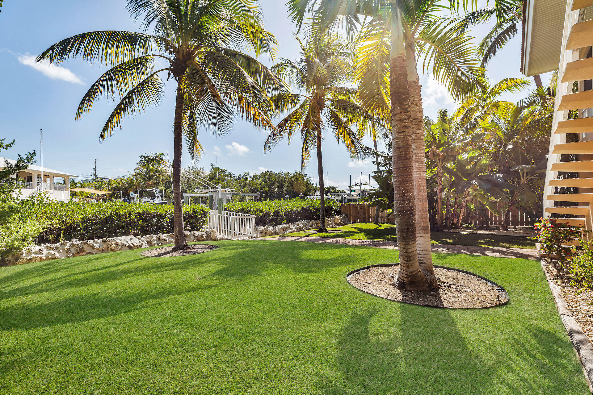 845 Copa D Oro Marathon, FL 33050 - Photo 10 of 41 a view of a backyard with palm trees