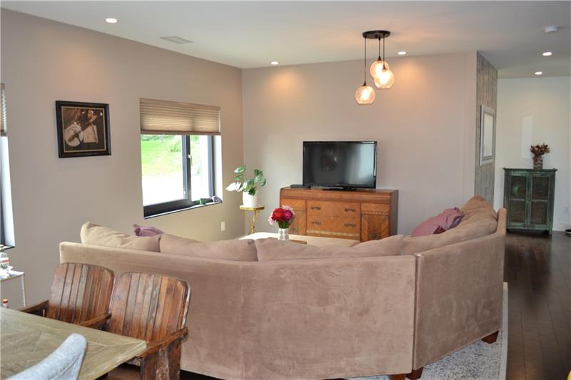 2885 Fernwald Road Pittsburgh, PA 15217 - Photo 8 of 25 THE EXPANSIVE OPEN FLOOR PLAN ON THE ENTRY LEVEL OFFERS MANY OPTIONS FOR EASE OF LIVING....