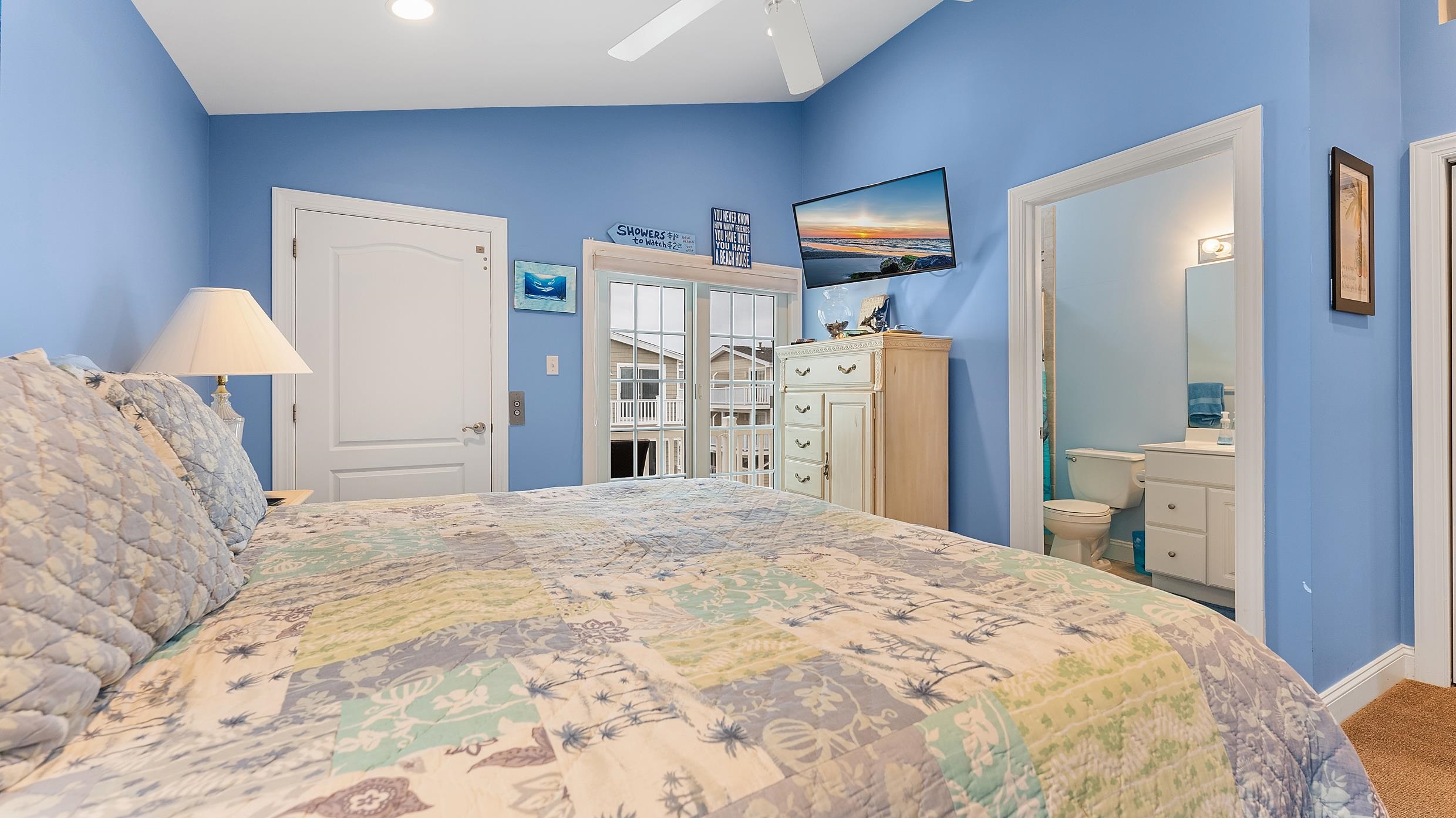 9 78th Street, Unit WEST Sea Isle City, NJ 08243 - Photo 12 of 24 a bed room with a bed and a bathroom