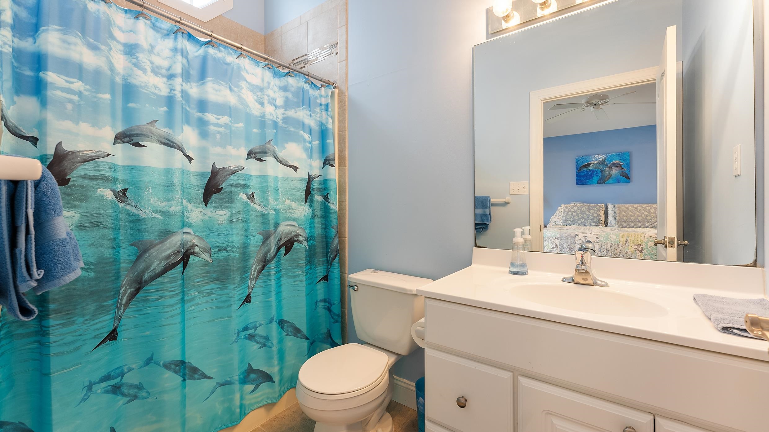 9 78th Street, Unit WEST Sea Isle City, NJ 08243 - Photo 13 of 24 a bathroom with a sink toilet and shower