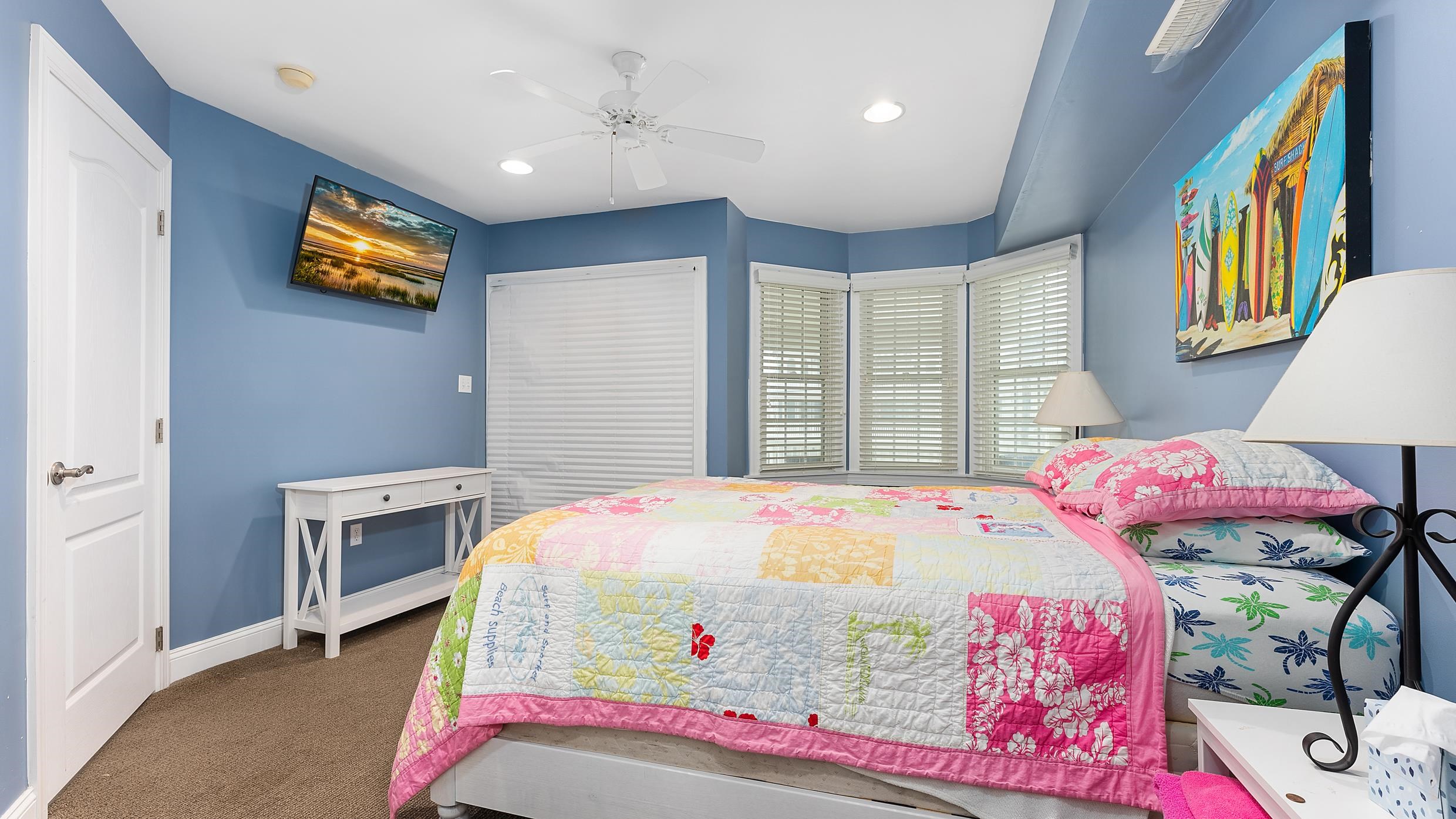 9 78th Street, Unit WEST Sea Isle City, NJ 08243 - Photo 15 of 24 a bedroom with a bed and dresser