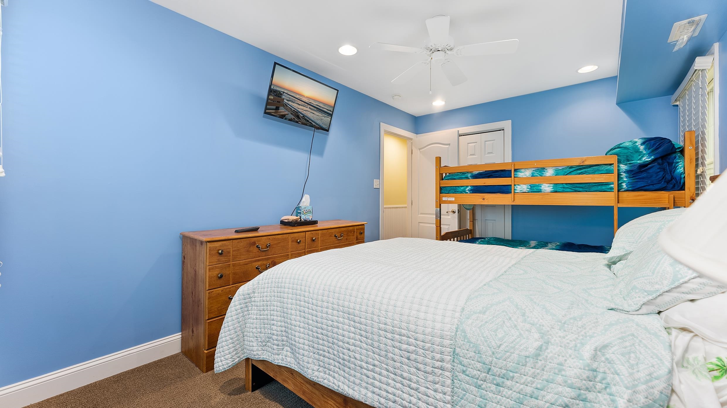 9 78th Street, Unit WEST Sea Isle City, NJ 08243 - Photo 17 of 24 a bedroom with a bed and a tv