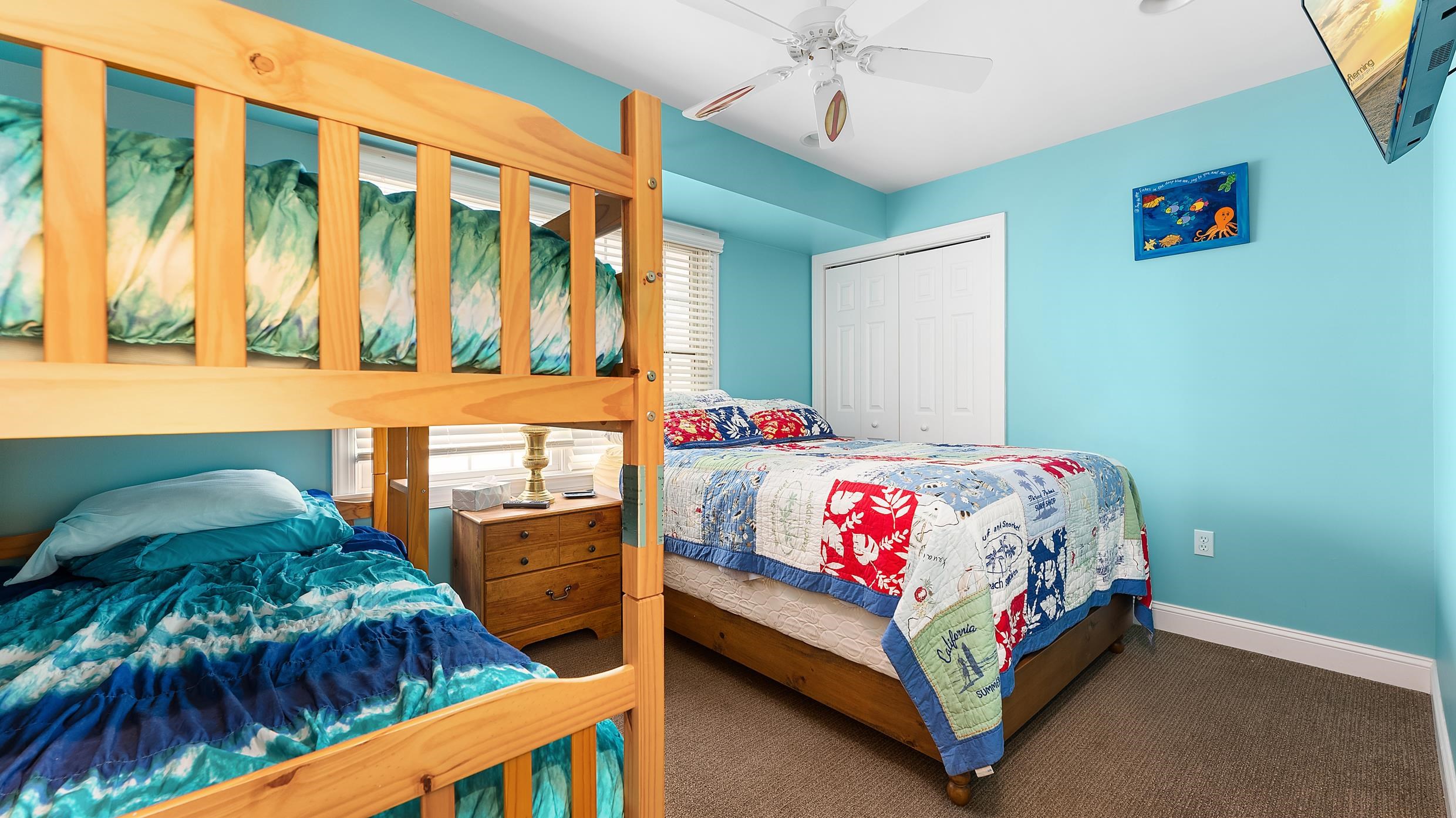 9 78th Street, Unit WEST Sea Isle City, NJ 08243 - Photo 19 of 24 a bedroom with a bed and a window