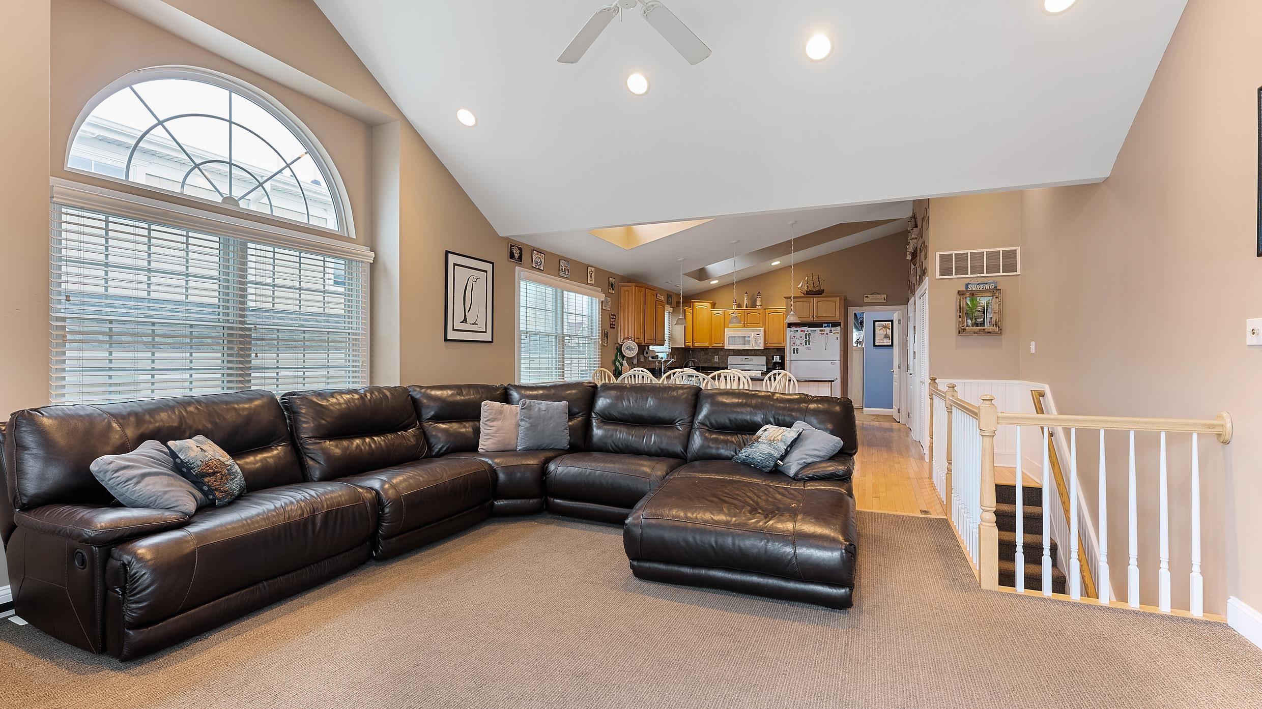 9 78th Street, Unit WEST Sea Isle City, NJ 08243 - Photo 4 of 24 a living room with furniture and a large window