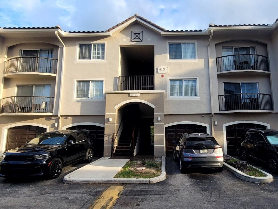 4197 Haverhill Road, Unit 212 West Palm Beach, FL 33417 - Photo 1 of 34 GI 212 Exterior Painted 20260523_185714