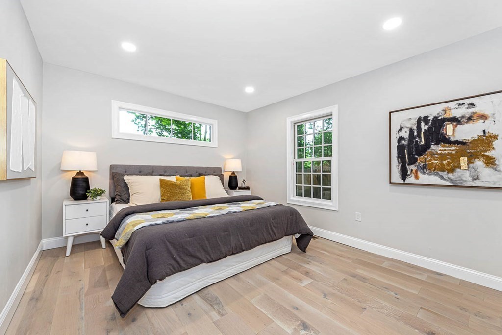 36-38 Johnswood Road Boston, MA 02131 - Photo 14 of 42 a bedroom with a bed and a painting on the wall