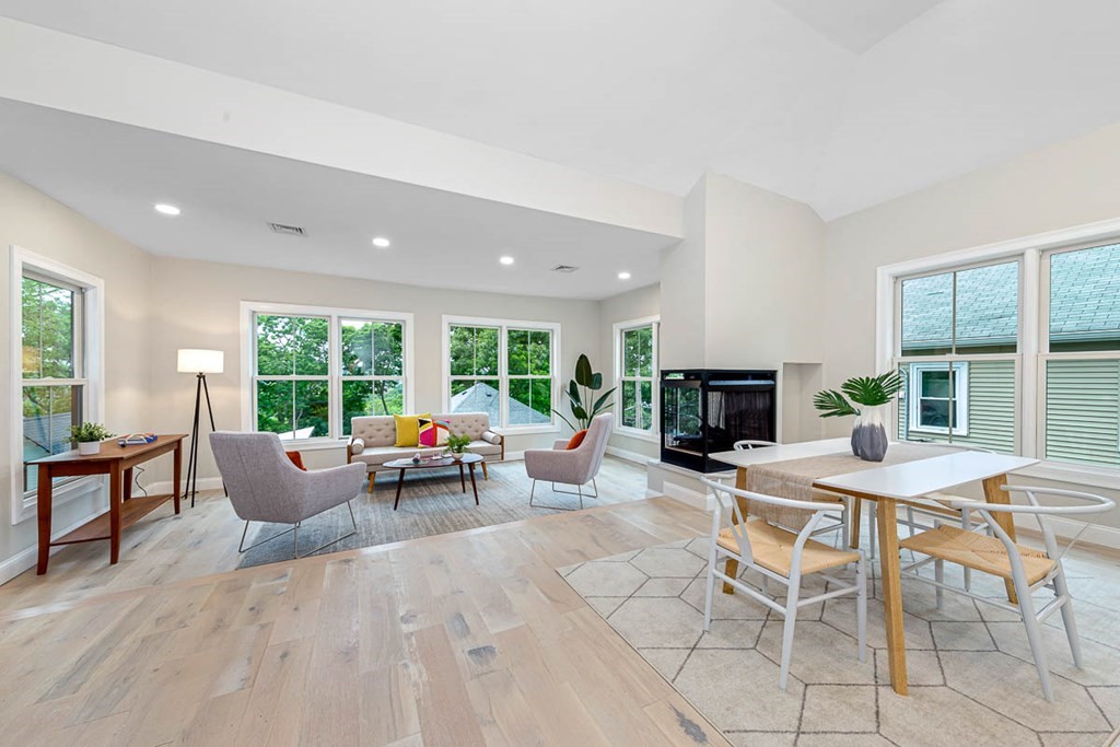 36-38 Johnswood Road Boston, MA 02131 - Photo 26 of 42 a living room with fireplace furniture and a large window