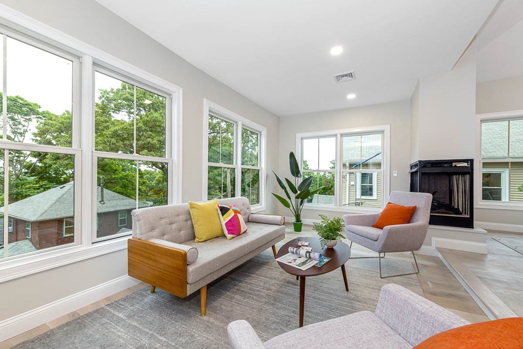 36-38 Johnswood Road Boston, MA 02131 - Photo 28 of 42 a living room with furniture and a large window