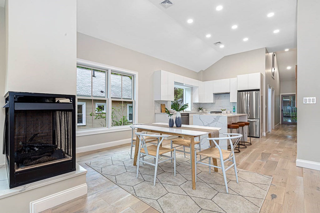 36-38 Johnswood Road Boston, MA 02131 - Photo 32 of 42 a dining room with furniture and a fireplace