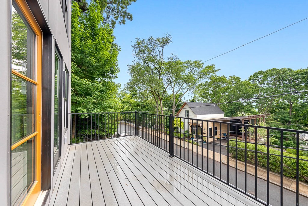 36-38 Johnswood Road Boston, MA 02131 - Photo 5 of 42 a view of a balcony with wooden floor