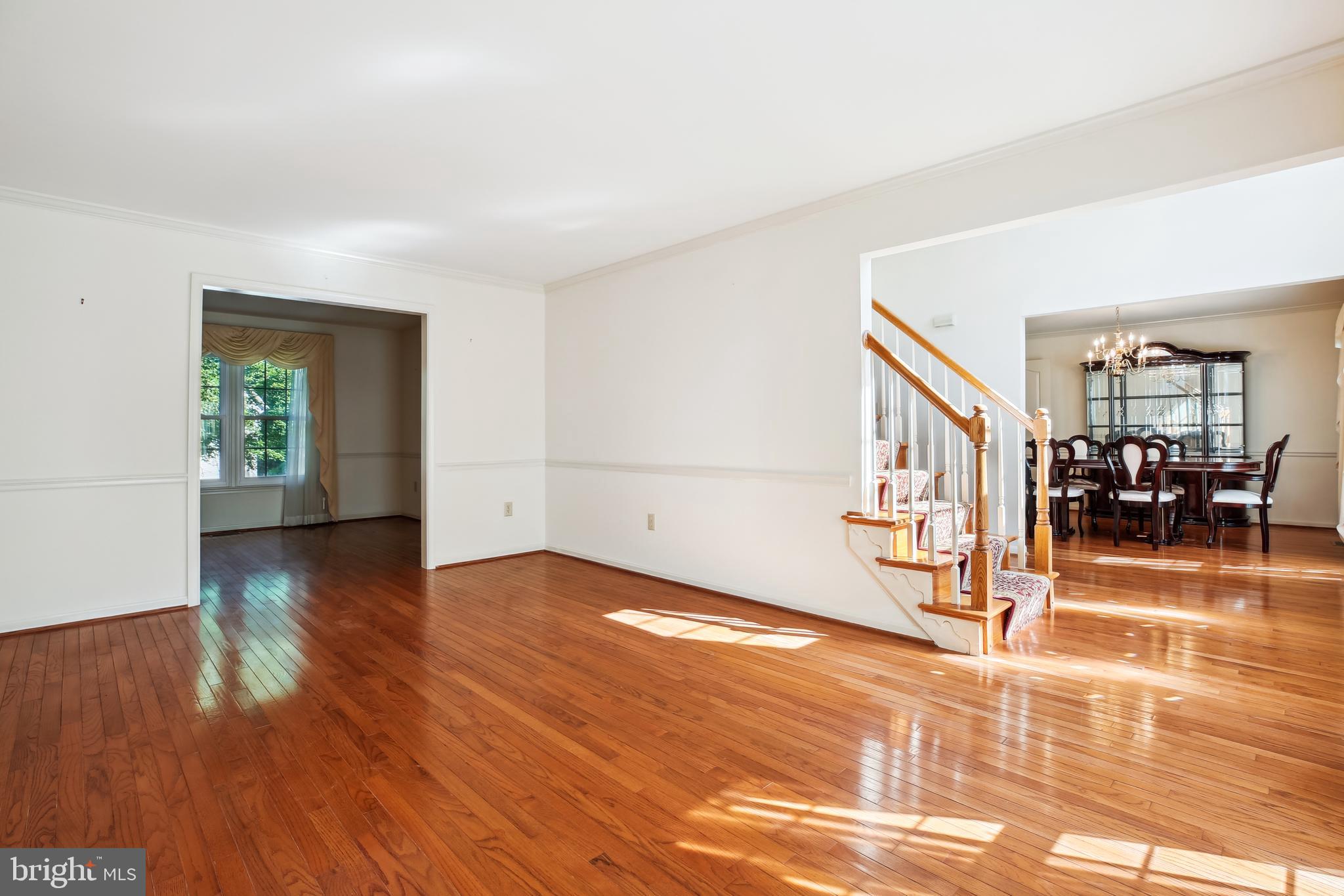 13112 Riviera Terrace Silver Spring, MD 20904 - Photo 17 of 72 Living room looking into dining and family rooms