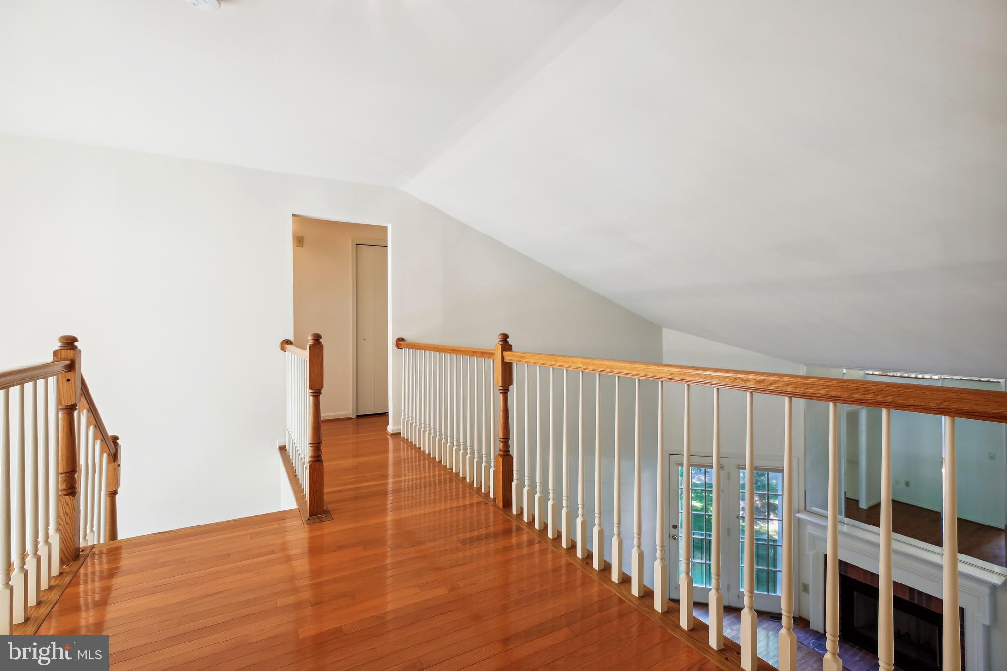 13112 Riviera Terrace Silver Spring, MD 20904 - Photo 27 of 72 Upper level walkway leading to Primary bedroom