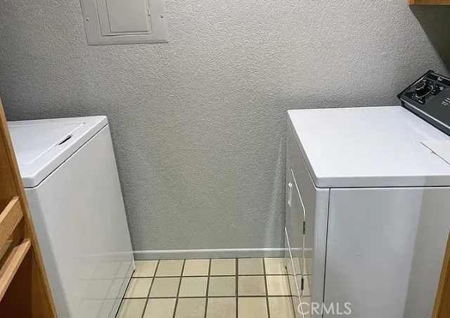 a kitchen with a refrigerator stove and microwave