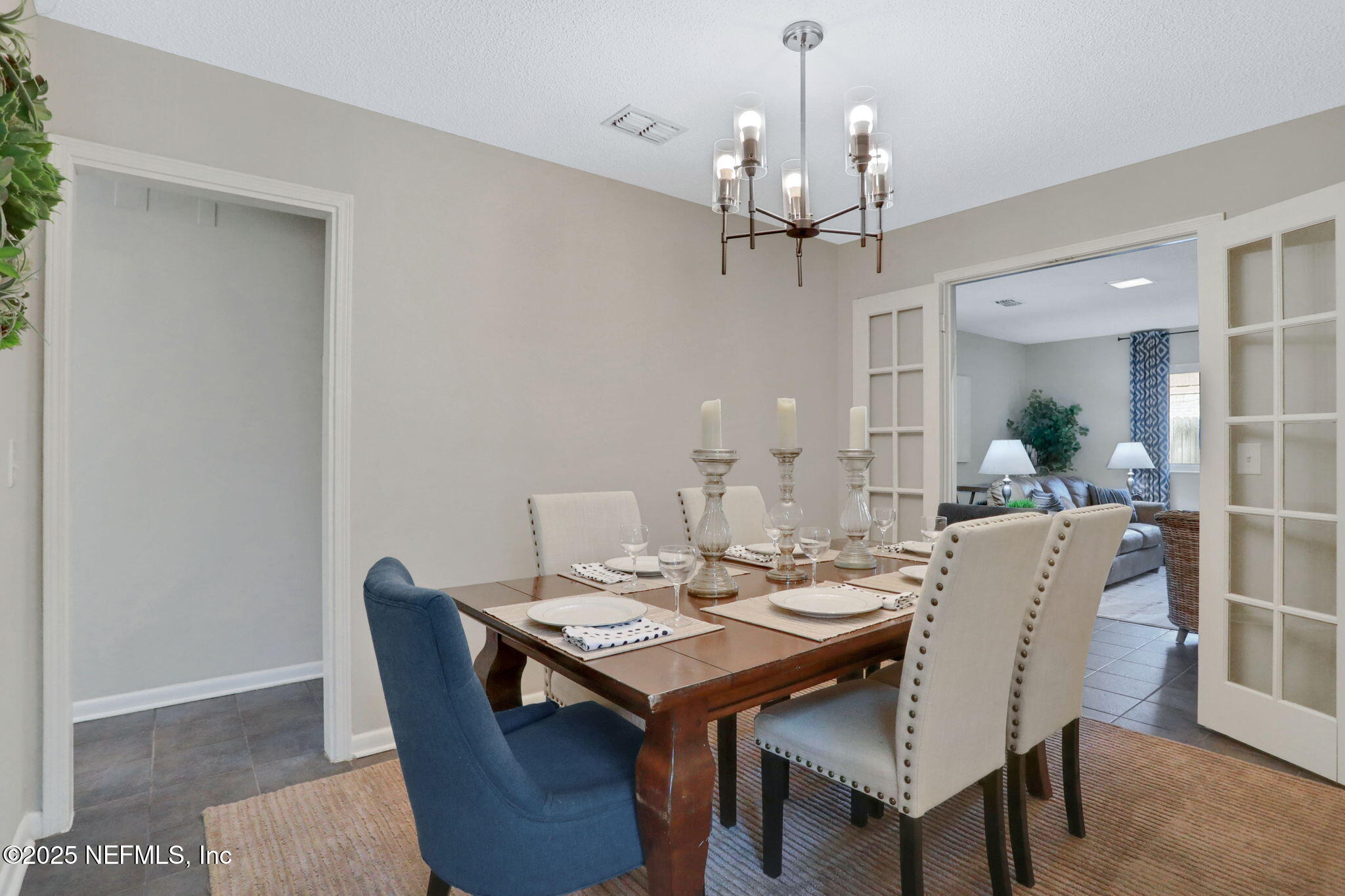5182 Rathbone Drive Jacksonville, FL 32257 - Photo 12 of 30 French Doors between Dining and Living R