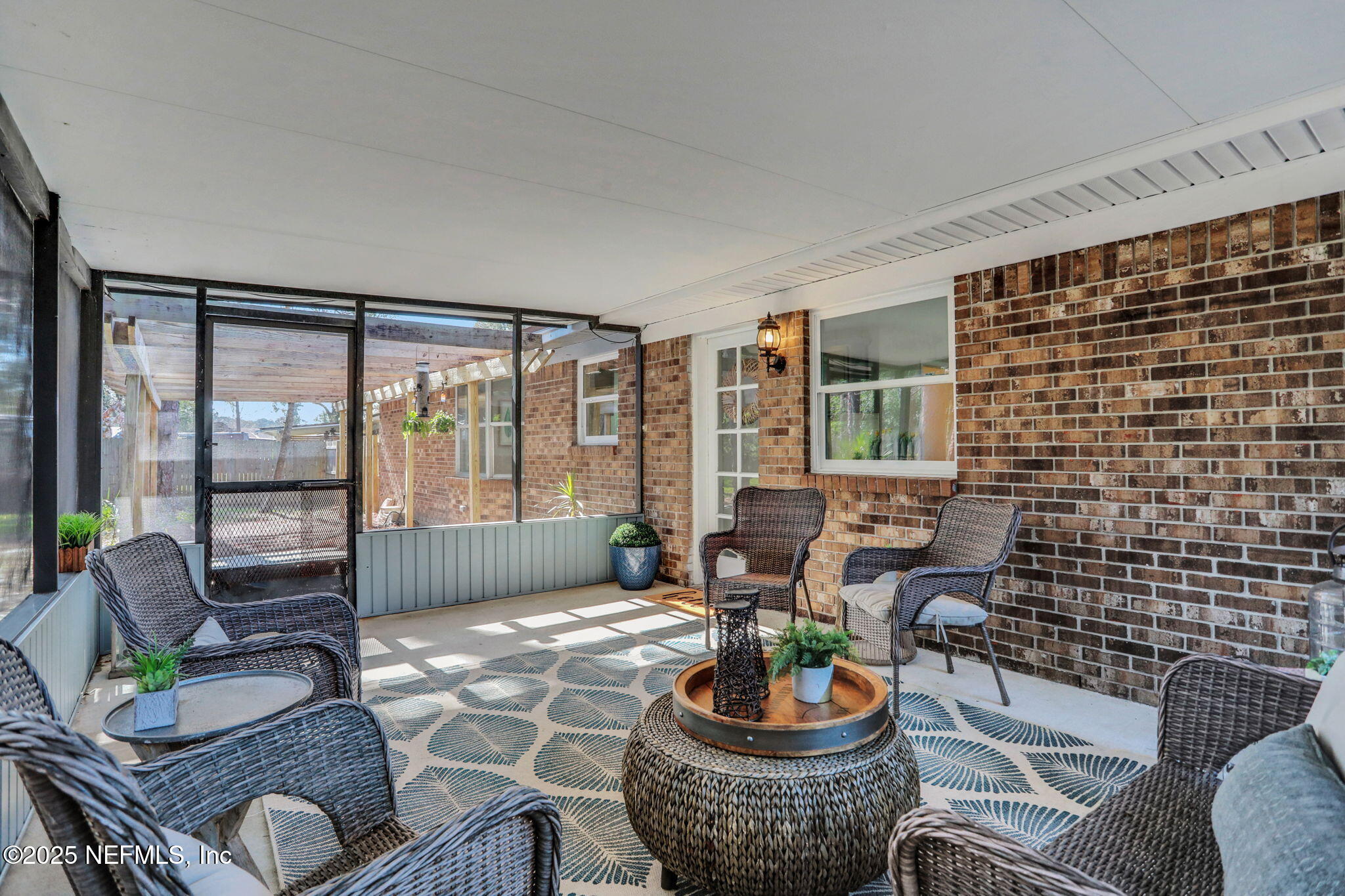 5182 Rathbone Drive Jacksonville, FL 32257 - Photo 23 of 30 Screened Porch with Backyard Views