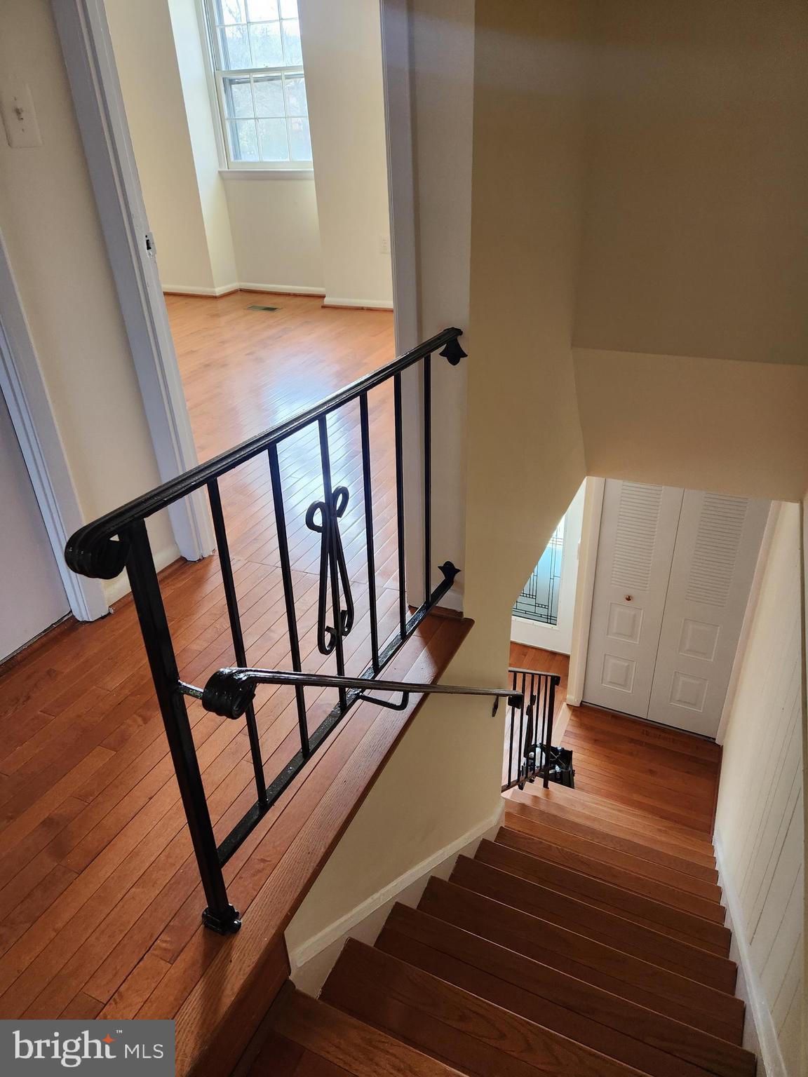 8509 Imperial Drive, Unit 7B Laurel, MD 20708 - Photo 21 of 36 a view of entryway with wooden floor and stairs