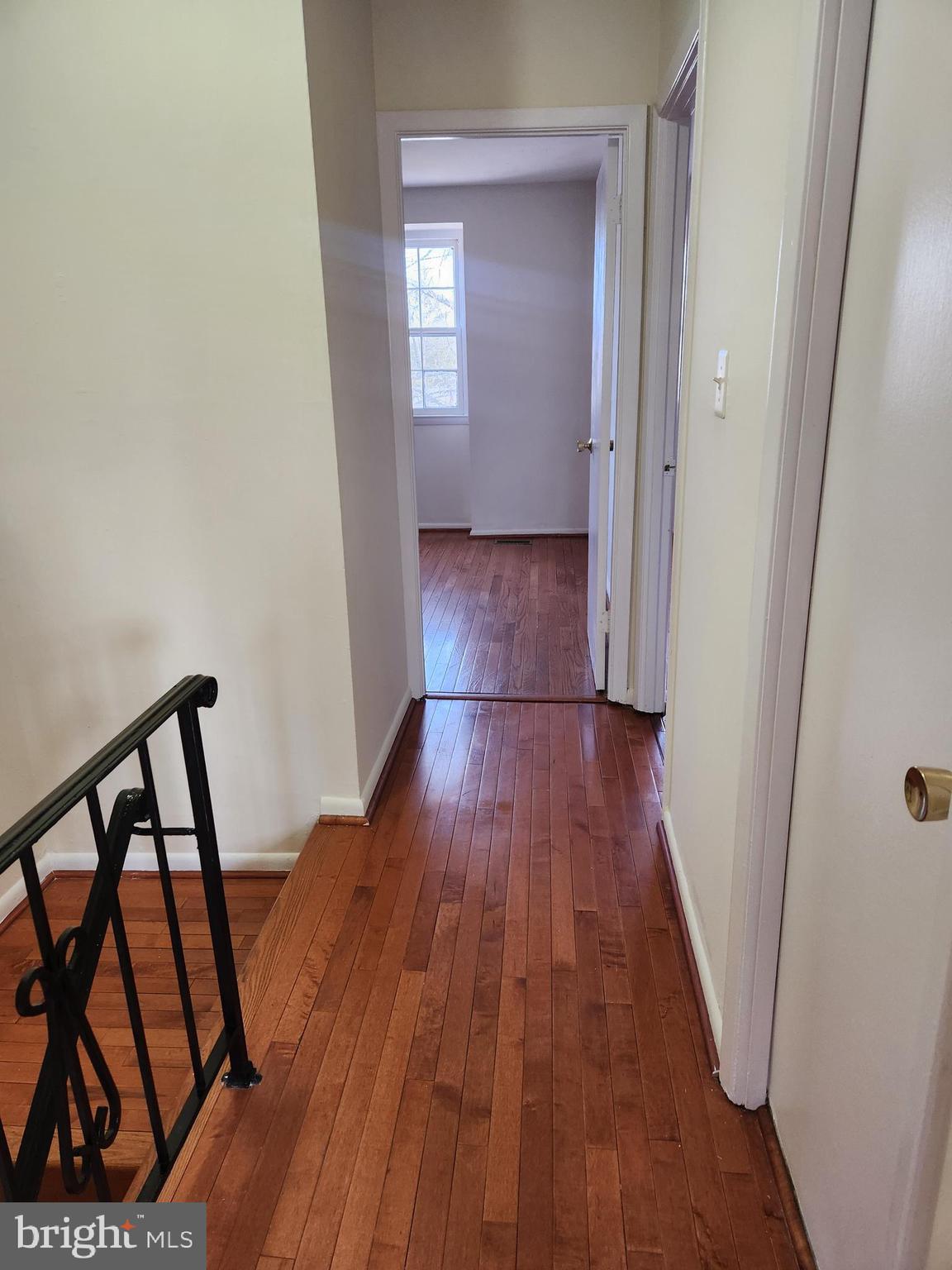 8509 Imperial Drive, Unit 7B Laurel, MD 20708 - Photo 22 of 36 a view of hallway with wooden floor