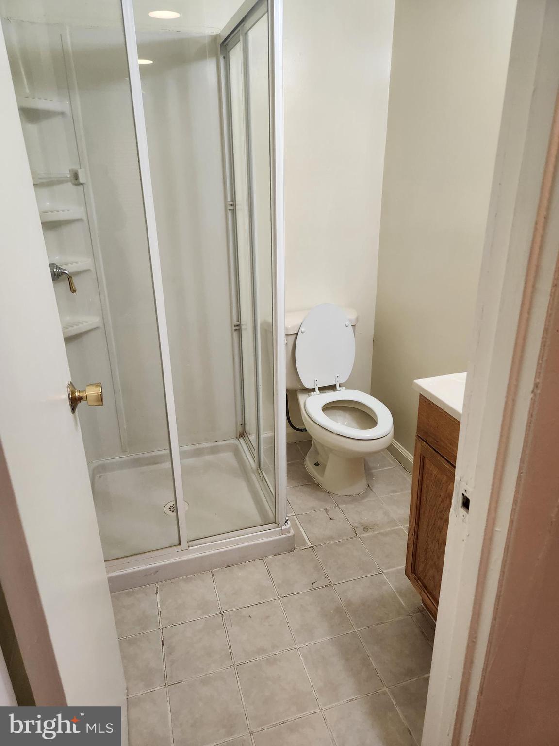 8509 Imperial Drive, Unit 7B Laurel, MD 20708 - Photo 32 of 36 a bathroom with a sink and toilet