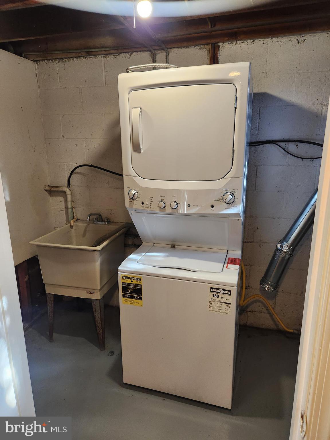 8509 Imperial Drive, Unit 7B Laurel, MD 20708 - Photo 33 of 36 a utility room with dryer and washer