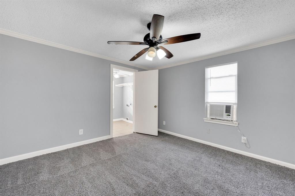 412 East Avenue F Midlothian, TX 76065 - Photo 2 of 12 a view of an empty room with a window