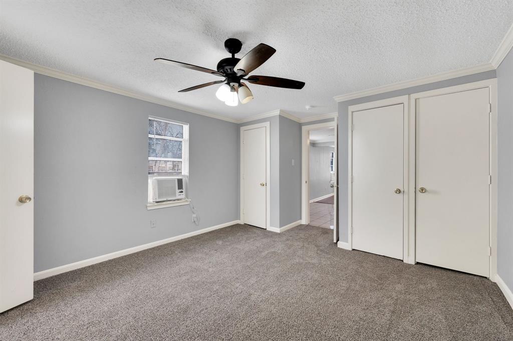 412 East Avenue F Midlothian, TX 76065 - Photo 3 of 12 a view of an empty room with a window