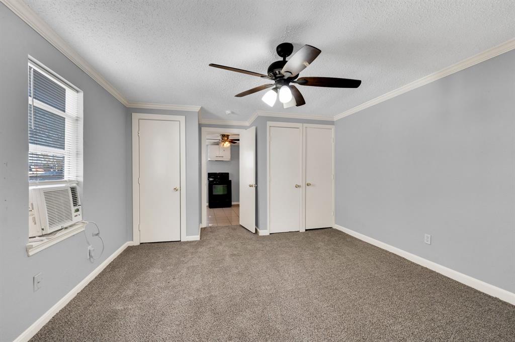 412 East Avenue F Midlothian, TX 76065 - Photo 4 of 12 a view of an empty room and window