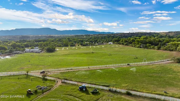 a view of a lake with a big yard