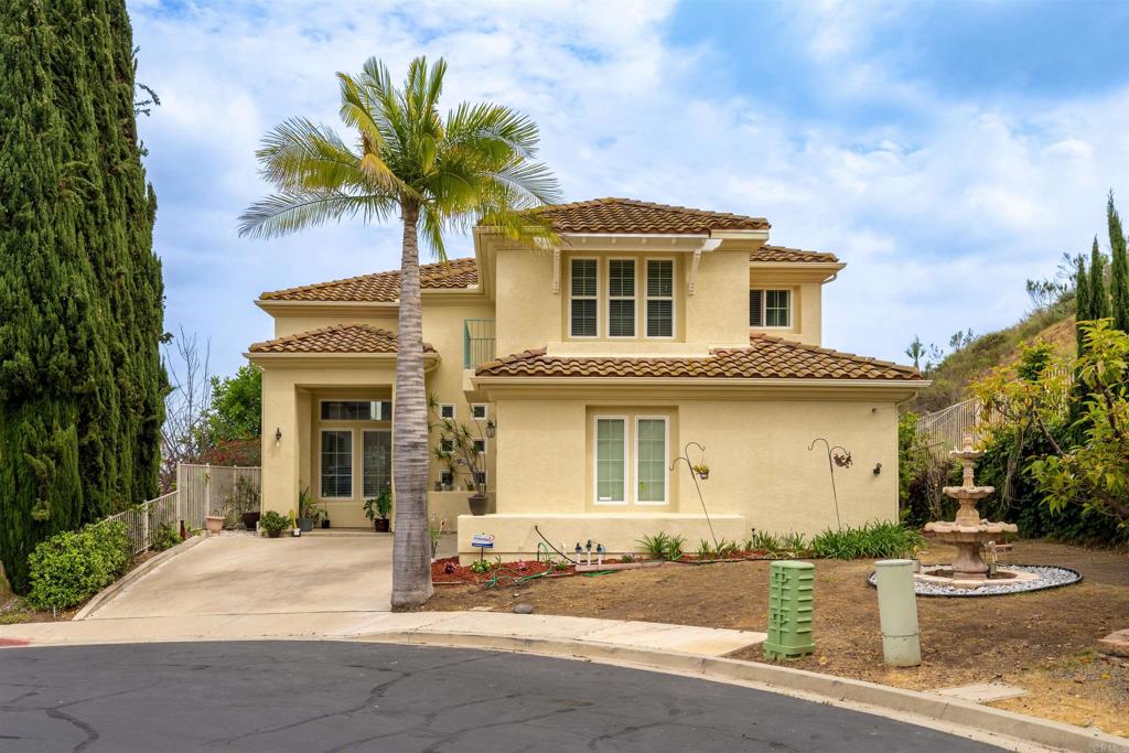 2007 Pleasant Waters Court Spring Valley, CA 91977 - Photo 22 of 22 a front view of a house with a yard