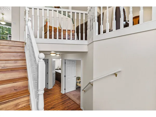 a view of entryway with wooden floor