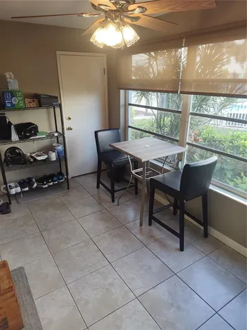 a view of house with outdoor seating space