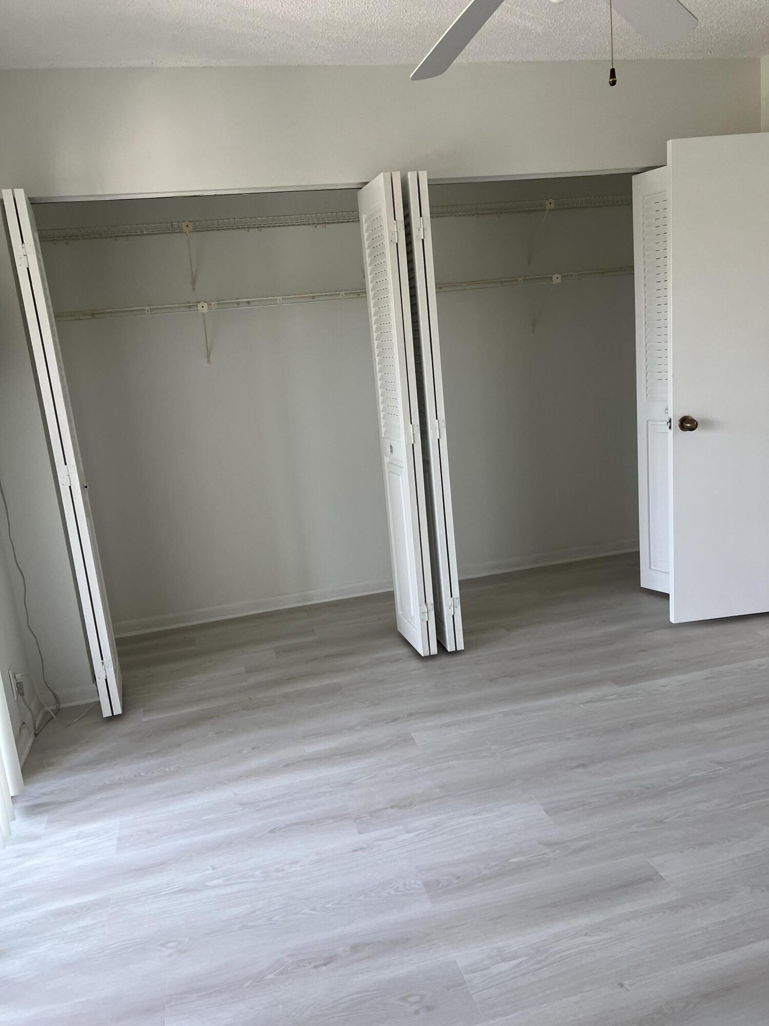 36 Mansfield B Boca Raton, FL 33434 - Photo 10 of 17 Wall to wall Bedrm Closet IMG_5413