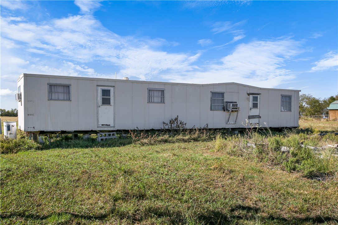 1983 Battle Lake Road Mart, TX 76664 - Photo 5 of 8 a view of house with backyard and garden