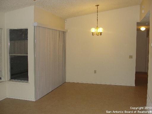 16307 Bitter Creek Street San Antonio, TX 78247 - Photo 3 of 12 a view of a room with wooden floor
