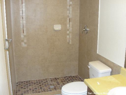 16307 Bitter Creek Street San Antonio, TX 78247 - Photo 8 of 12 a bathroom with a toilet and a shower