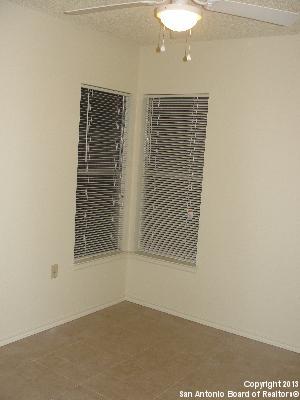 16307 Bitter Creek Street San Antonio, TX 78247 - Photo 9 of 12 a view of an empty room with a window