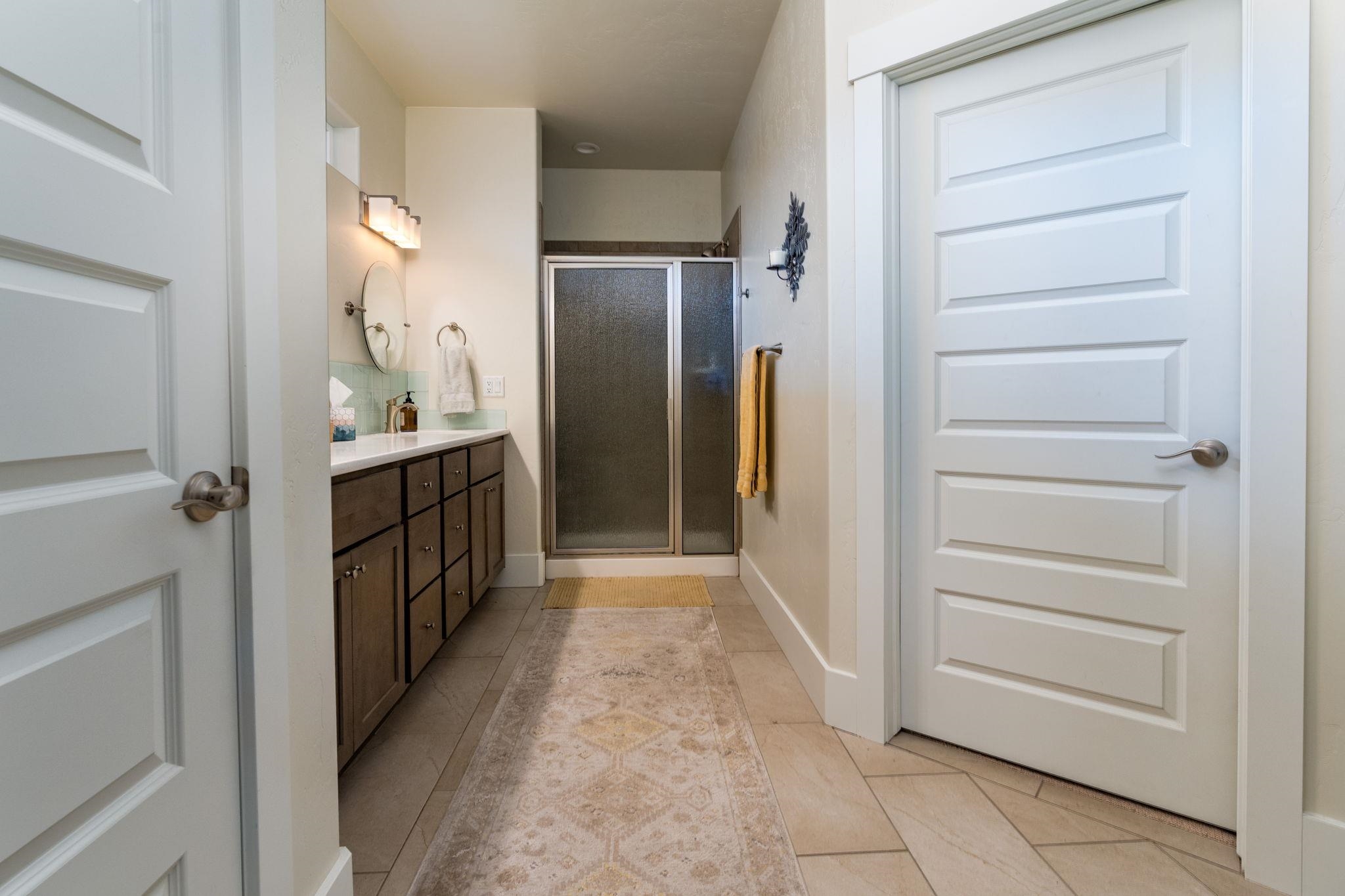 1222 Periwinkle Lane Fruita, CO 81521 - Photo 14 of 27 a view of hallway with cabinets