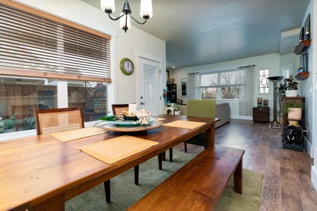 a living room with furniture and a table