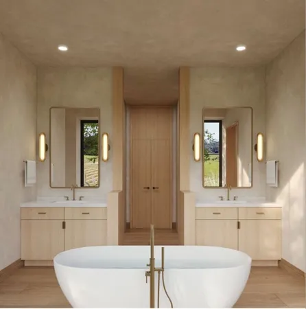 a bathroom with a bathtub a sink and a mirror