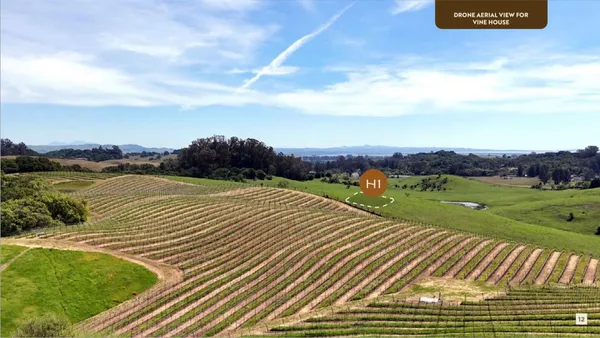 a view of a lake with a yard