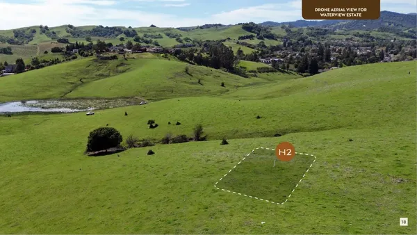 an aerial view of a golf course with a garden